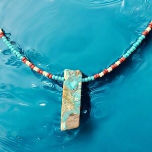 Handmade Necklace featuring genuine stone center piece.